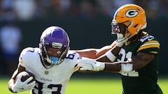 GREEN BAY, WISCONSIN - SEPTEMBER 29: Jalen Nailor #83 of the Minnesota Vikings carries the ball against Eric Stokes #21 of the Green Bay Packers during the first quarter of the game at Lambeau Field on September 29, 2024 in Green Bay, Wisconsin.   Stacy Revere/Getty Images/AFP (Photo by Stacy Revere / GETTY IMAGES NORTH AMERICA / Getty Images via AFP)