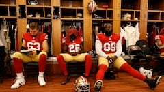 SANTA CLARA, CA - SEPTEMBER 29: Nick Zakelj #63, Isaac Yiadom #22 and Maliek Collins #99 of the San Francisco 49ers in the locker room before the game against the New England Patriots at Levi's Stadium on September 29, 2024 in Santa Clara, California. The 49ers defeated the Patriots 30-13. (Photo by Michael Zagaris/San Francisco 49ers/Getty Images)