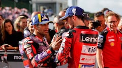 MotoGP - Japanese Grand Prix - Mobility Resort Motegi, Motegi, Japan - October 6, 2024 Ducati Lenovo Team's Francesco Bagnaia celebrates after winning the Japanese Grand Prix with second placed Prima Pramac Racing's Jorge Martin REUTERS/Kim Kyung-Hoon