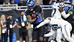 Sep 30, 2024; Detroit, Michigan, USA; Detroit Lions running back Jahmyr Gibbs (26) scores a touchdown against the Seattle Seahawks in the second quarter at Ford Field. Mandatory Credit: Eamon Horwedel-Imagn Images