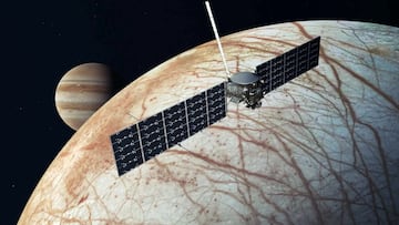 An artist's concept shows a NASA's Europa Clipper spacecraft flying past Jupiter's moon Europa in this undated illustration released by NASA. NASA/JPL-Caltech/Handout via REUTERS THIS IMAGE HAS BEEN SUPPLIED BY A THIRD PARTY. MANDATORY CREDIT.