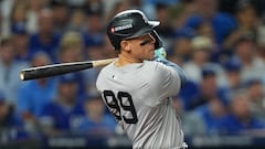 Oct 10, 2024; Kansas City, Missouri, USA; New York Yankees outfielder Aaron Judge (99) hits a double during the sixth inning against the Kansas City Royals during game four of the ALDS for the 2024 MLB Playoffs at Kauffman Stadium. Mandatory Credit: Jay Biggerstaff-Imagn Images